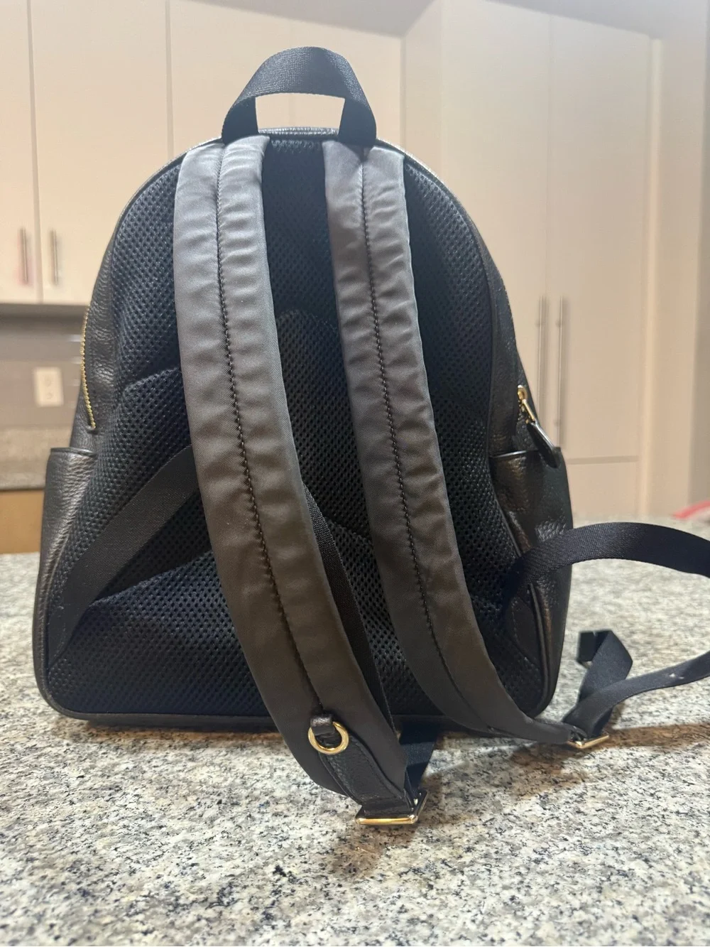 Coach compact pebbled